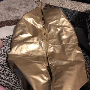 Kim Kardashian gold slouchy bag